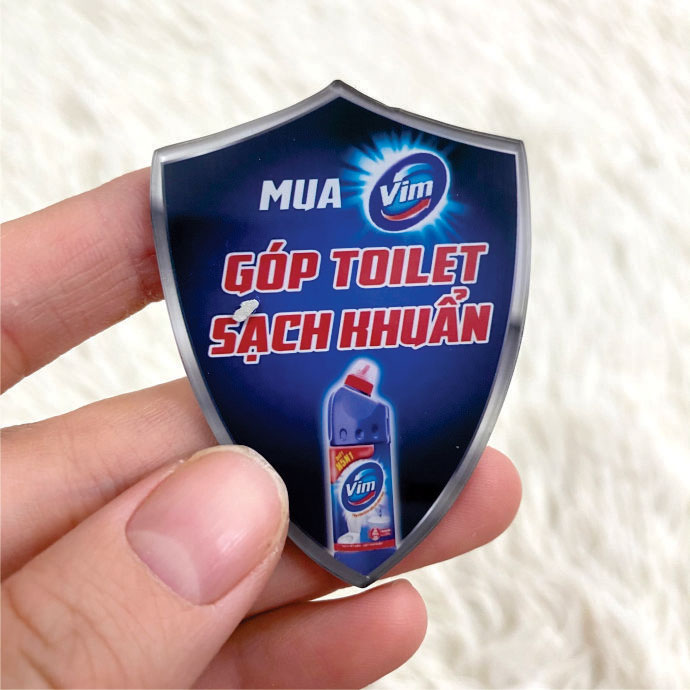 HUY HIỆU CÀI ÁO MICA IN LOGO VIM - SẢN XUẤT HUY HIỆU CÀI ÁO GIÁ RẺ