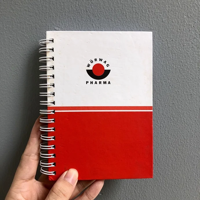 Sổ Tay Lò Xo Wörwag Pharma – Sổ Ghi Chép Quà Tặng Doanh Nghiệp Bìa Đỏ Trắng