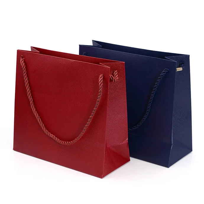 Túi giấy cao cấp trơn màu đỏ và xanh navy – quai dây dù xoắn sang trọng